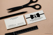 emboss-logo-silver-black-foil-stamping-white-cotton-cardstock-business-card-template-120002-dapper-penguin-rockdesign-image-0