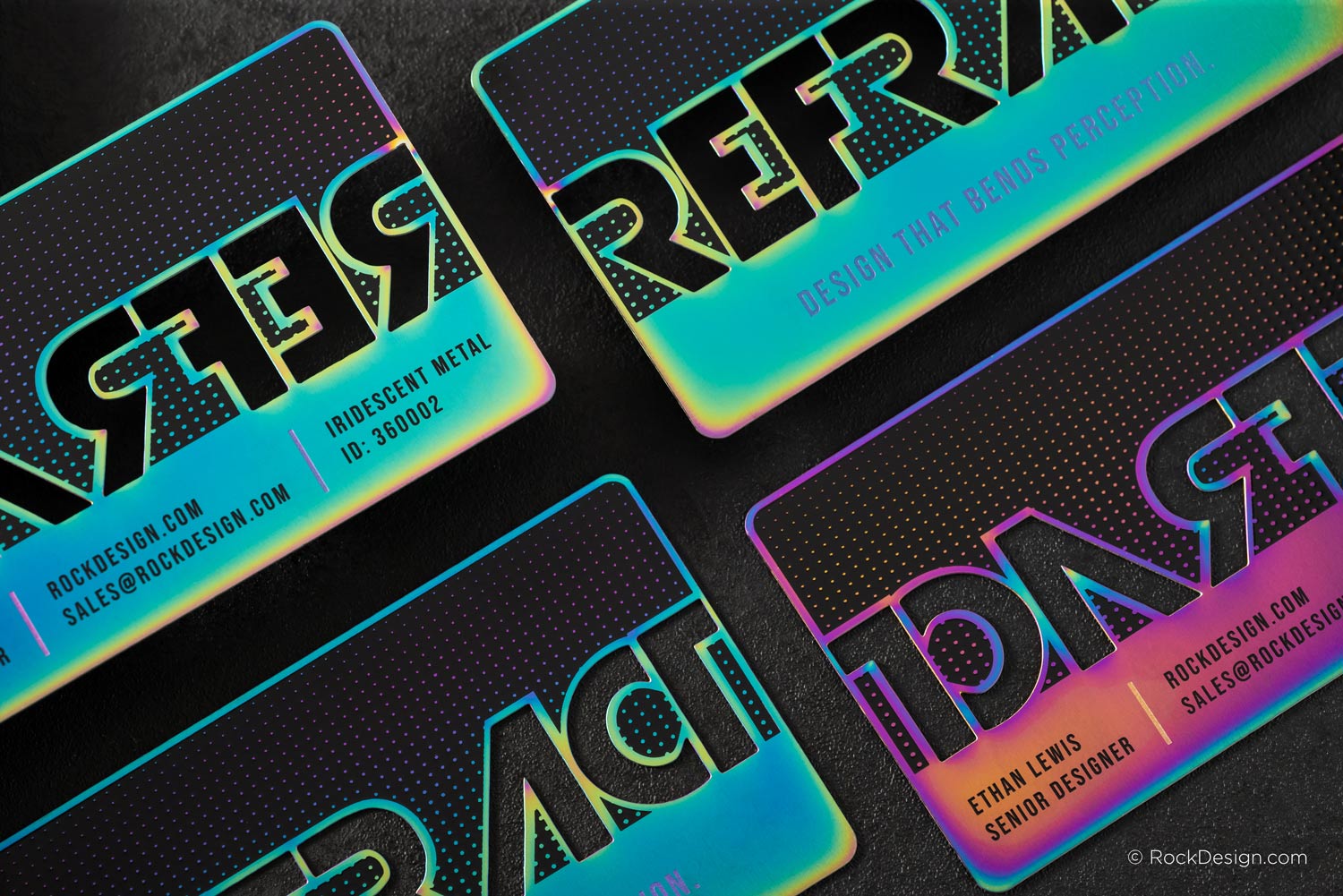 Iridescent metal business cards with refractive finish, etched typography, and bold modern design showcasing luxury metal card printing.