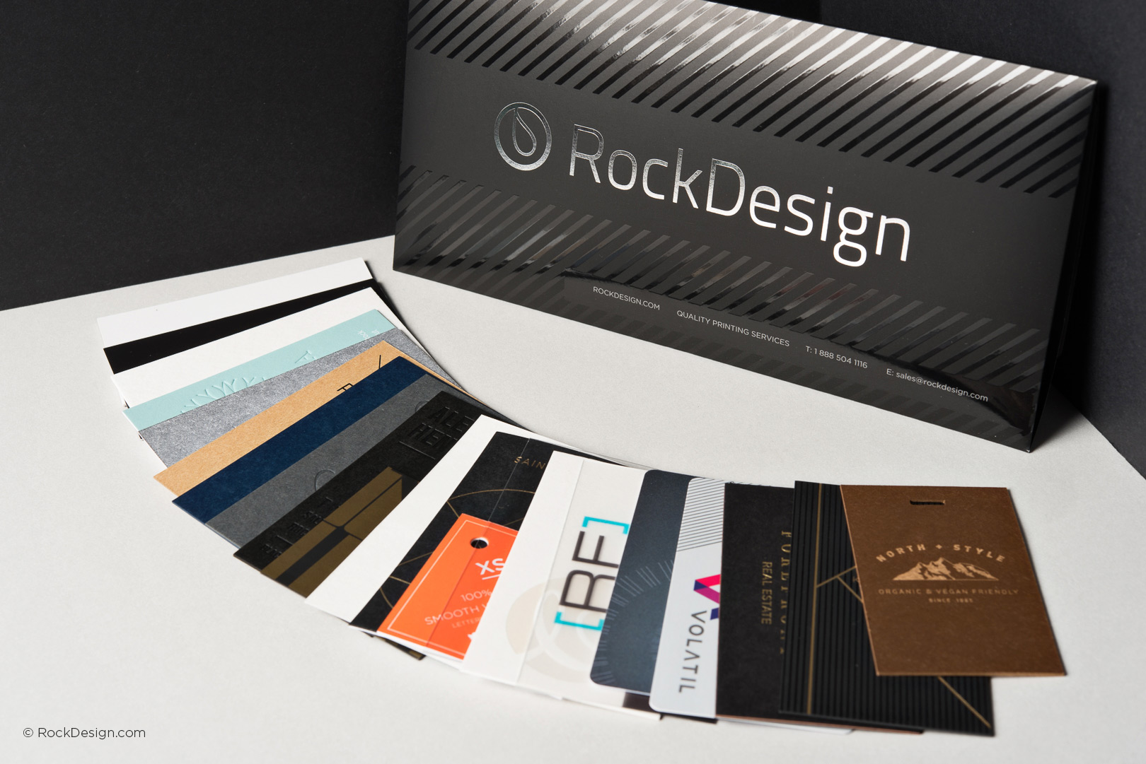 Luxury business card samples by RockDesign featuring premium materials, finishes, and modern design options for professional branding.