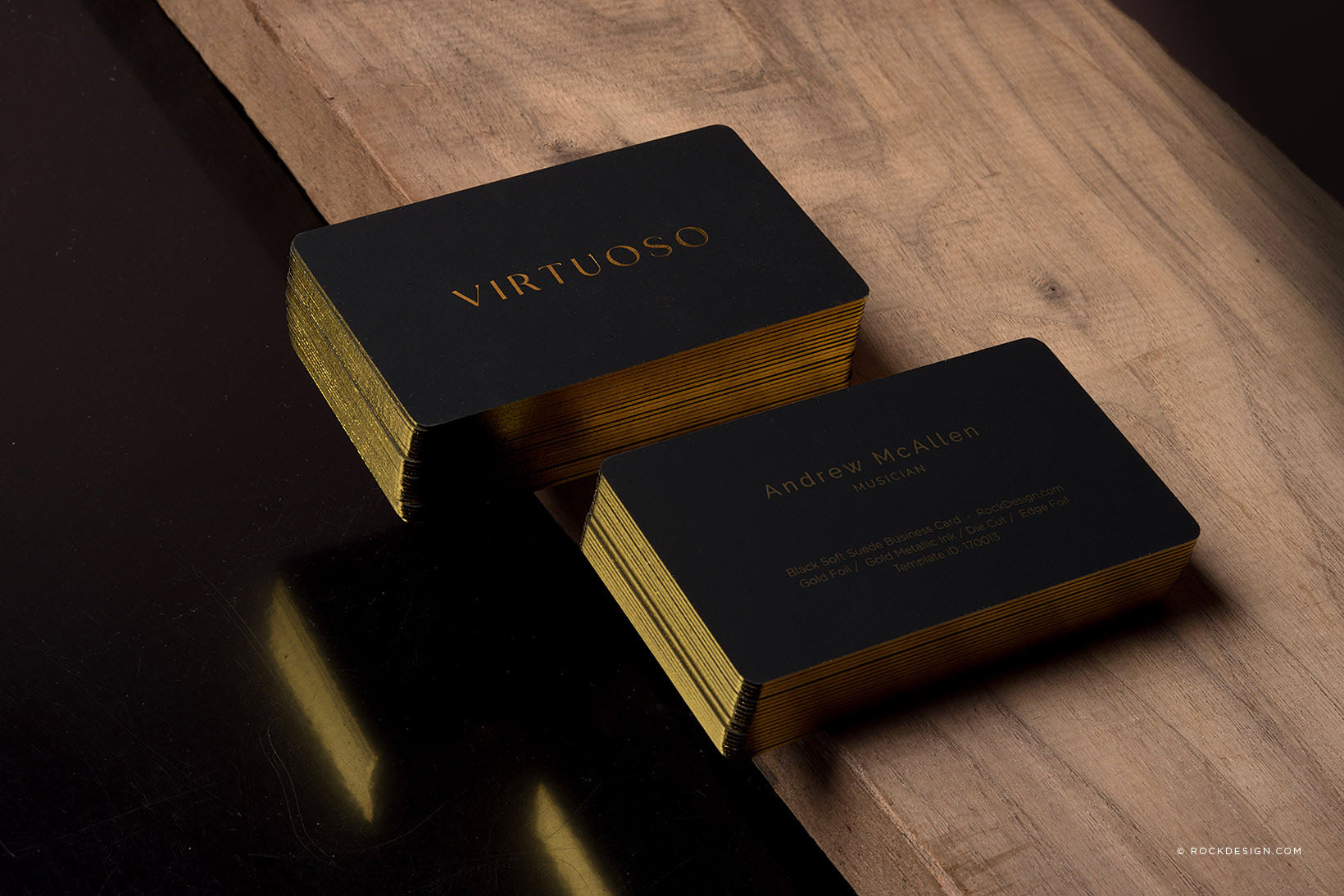 Luxury  black suede business cards with gold foil accents, gold edges, and custom design for musician Andrew McAllen by RockDesign.