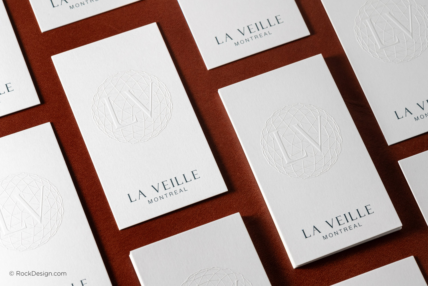 Premium smooth uncoated business cards featuring matte raised spot UV and clean, timeless branding