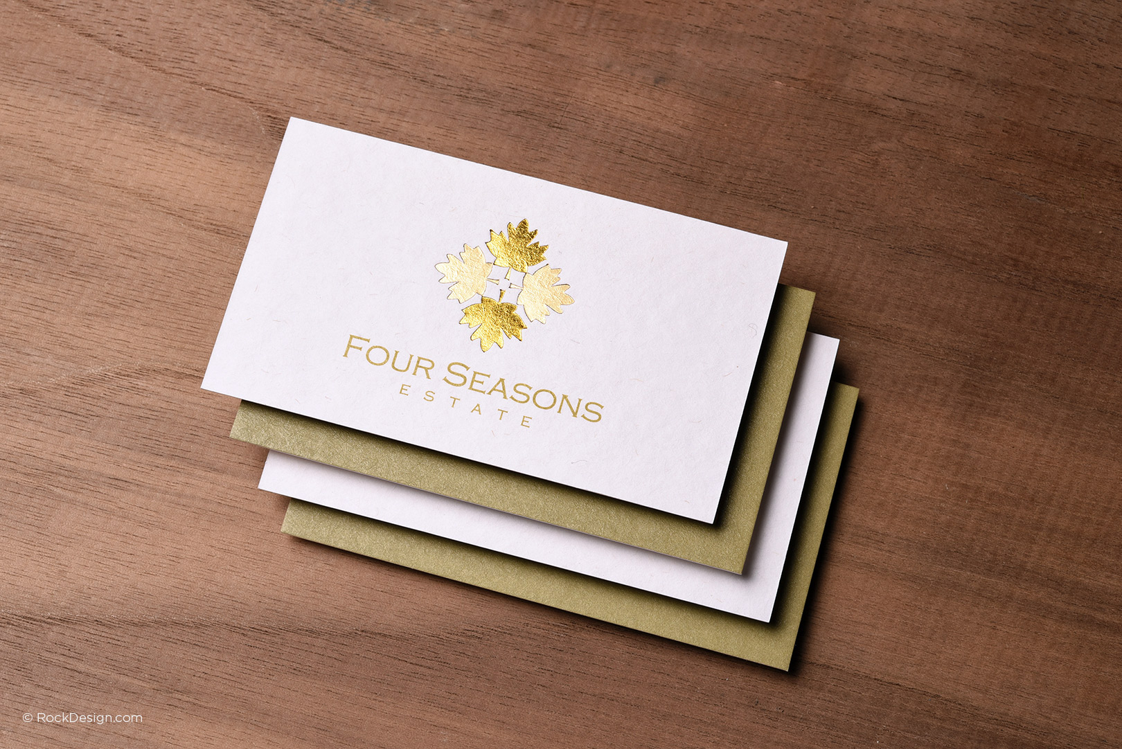 Elegant business cards with gold foil logo and text on premium uncoated paper – RockDesign