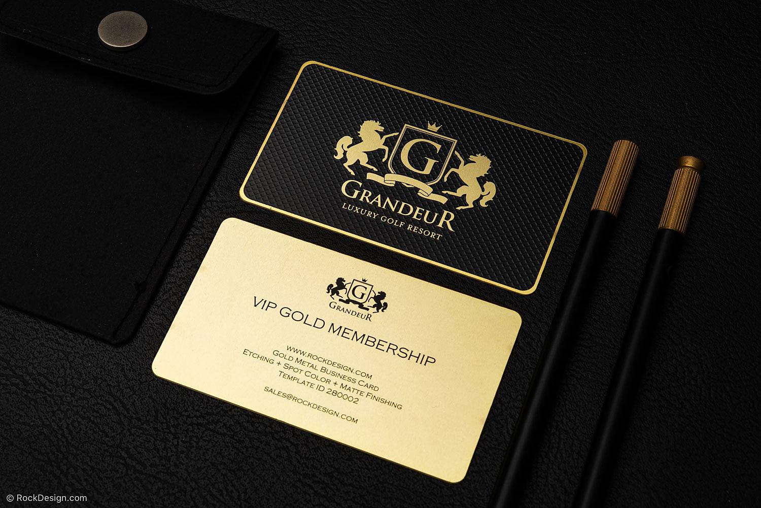 Luxury black and gold metal business cards for Grandeur Golf Resort with VIP Gold Membership design on black leather background.
